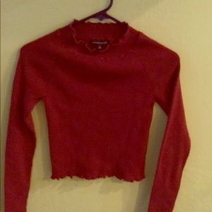 Crop sweater with ruffle edging